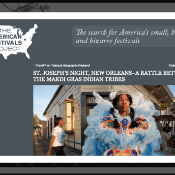 Screenshot of a webpage from the "Land of Opportunity" film website showing a popup window. The pop window shows a separate webpage with a blue-grey background. At the top left is a graphic of grey text "The American Festivals Project" overlaid over a white image of the continental United States. At the top right, there is an italicized text that reads "The search for America's small, hidden and bizarre festivals." An article headline that reads "St. Joseph's Night, New Orleans - A battle between the Mardi Gras Indian Tribes" precedes a photo of a young woman in a costume combining Native American beaded regalia, light blue feather boas, and a tiara.