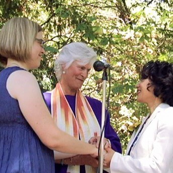 A still from The Campaign. Two women in their marriage ceremony.