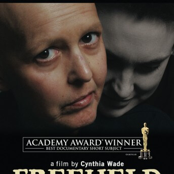 Poster of Freeheld. Color close up of a woman's face, looking up. Behind her, close up of another woman's face, in black-and-white, leaning on the first woman's shoulder. The poster include text "Academy Award Winner - Best Documentary Short Subject" and "a film by Cynthia Wade Freeheld." In the top of the image includes festival laurels.