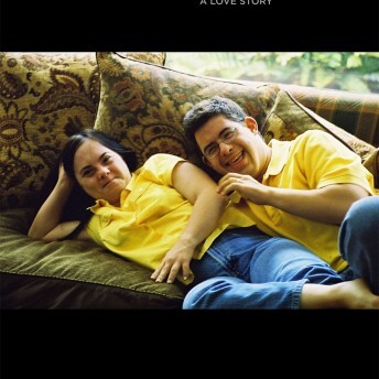 Poster from Moica & David. Below text that reads, "Monica & David A Love Story" are two people wearing yellow polo shirts and jeans laying next to eachother on a couch with floral pillows. They are both smiling. Film credits are listed on the poster below the couple.