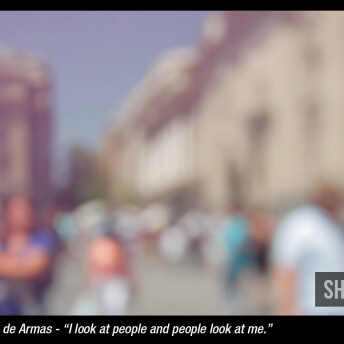 Out-of-focus shot of an exterior with people walking.