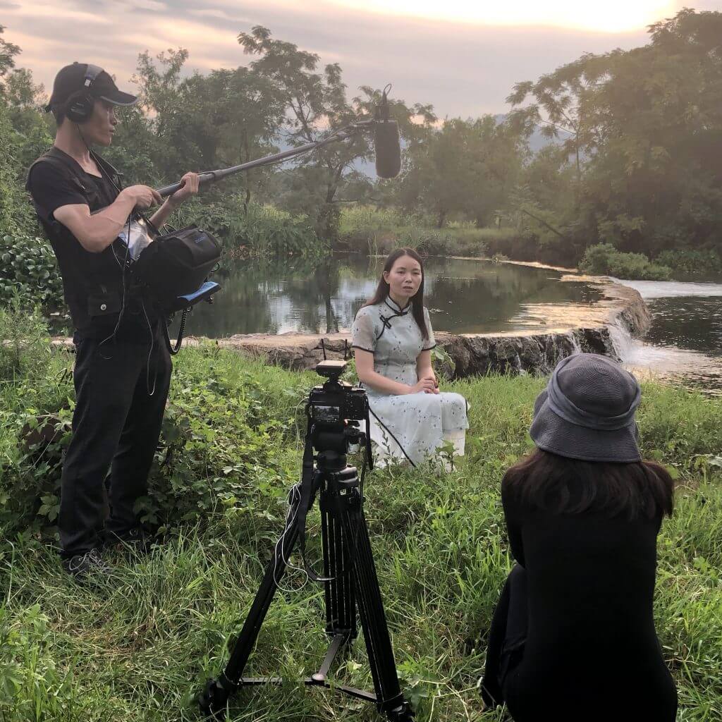 Page Name Page URL Image URL Alternative Text 2021 Chicken & Egg Award Recipient https://chickeneggpics.org/grantee/elwira-niewiera/ https://chickeneggpics.org/wp-content/uploads/2021/01/Niewiera_Elwira_2021_CEA_The_Prince_and_the-Dybbuk_1-344x344.jpg Black and white still from The Prince and the Dybbuk. Three people –a woman flanked by two men–are seated in front of a table, each holding up an espresso cup. The woman is Sophia Loren. 2021 Chicken & Egg Award Recipient https://chickeneggpics.org/grantee/elwira-niewiera/ https://chickeneggpics.org/wp-content/uploads/2021/01/Niewiera_Elwira_2021_CEA_Domino_Effect_1-344x344.jpg Still from The Domino Effect. A close up of woman leaning her head on a man's shoulder. His eyes are closed, and she is slightly smiling, with her face hidden in his neck. They are standing in front of water. 2021 Chicken & Egg Award Recipient https://chickeneggpics.org/grantee/elwira-niewiera/ https://chickeneggpics.org/wp-content/uploads/2021/01/Niewiera_Elwira_2021_CEA_Freedom_Highway_CURRENT-344x344.jpg Black and white still from Freedom Highway. A woman is holding up a flag above her head. She is illuminated and the focus of the photo, among a crowd of people who are also holding signs and flags. 2021 Chicken & Egg Award Recipient https://chickeneggpics.org/grantee/elwira-niewiera/ https://chickeneggpics.org/wp-content/uploads/2021/01/Niewiera_Elwira_2021_CEA_Domino_Effect_2-344x344.jpg Still from The Domino Effect. A woman, in foreground, is holding the arm of a man, and they are standing in front of a sunlit body of water. 2021 Chicken & Egg Award Recipient https://chickeneggpics.org/grantee/elwira-niewiera/ https://chickeneggpics.org/wp-content/uploads/2021/01/Niewiera_Elwira_2021_CEA_Hamlet_Syndrom_1_CURRENT-344x344.jpg Still from The Hamlet Syndrome. A man and a woman look at a cellphone. Both are sitting. The man wears a camo jacket, the woman is dressed in jeans and a hoodie. The background is a cityscape. 2021 Chicken & Egg Award Recipient https://chickeneggpics.org/grantee/elwira-niewiera/ https://chickeneggpics.org/wp-content/uploads/2021/01/Niewiera_Elwira_2021_CEA_The_Prince_and_the-Dybbuk_2.tif Still from The Prince and the Dybbuk. A man is standing in front of a brightly-lit window. The photo appears to be a copy of an analog film still. The composition is grainy and overexposed. 2021 Chicken & Egg Award Recipient https://chickeneggpics.org/grantee/elwira-niewiera/ https://chickeneggpics.org/wp-content/uploads/2021/01/Niewiera_Elwira_2021_Production-Shot-344x344.jpg Production still. Elwira Niewiera watches a monitor of a scene that she is shooting. A man holding a boom mic is seen in the background. 2021 Chicken & Egg Award Recipient https://chickeneggpics.org/grantee/elwira-niewiera/ https://chickeneggpics.org/wp-content/uploads/2021/01/Niewiera_Elwira_2021_CEA_Headshot_BW.jpg Elwira Niewiera looking directly at the camera, slightly smiling. Black and white portrait. Enemies of the State https://chickeneggpics.org/grantee/enemies-of-the-state/ https://chickeneggpics.org/wp-content/uploads/2018/02/Sonia_Kennebeck_Director-and-Producer_BW-608x405.jpg Sonia Kennebeck looking directly at the camera. Black and white portrait. Eskape https://chickeneggpics.org/grantee/eskape/ https://chickeneggpics.org/wp-content/uploads/2020/03/EL-2020_Eskape_Neary-Adeline-Hay_ESKAPE_-image0_Film-Still-344x344.jpeg Still from Eskape. A close up of a woman sitting in a car with the seatbelt fastened. She wears glasses, and she is leaning her head to the side with her eyes closed. Eskape https://chickeneggpics.org/grantee/eskape/ https://chickeneggpics.org/wp-content/uploads/2020/03/EL-2020_Eskape_Neary-Adeline-Hay_ESKAPE_-image4_Film-Still-344x344.jpeg Still from Eskape. Overhead bird-eye view of a beach with waves and water along the bottom one-third. Two dark specks of people are lying on the beach, in the middle of the frame. Eskape https://chickeneggpics.org/grantee/eskape/ https://chickeneggpics.org/wp-content/uploads/2020/03/EL-2020_Eskape_Neary-Adeline-Hay_ESKAPE_-image6_Film-Still-344x344.jpeg Still from Eskape. Dimly lit, derelict room. Light filters in through the partially-caved in ceiling. There is mildew on the concrete walls and debris and dirt on the floor. Eskape https://chickeneggpics.org/grantee/eskape/ https://chickeneggpics.org/wp-content/uploads/2020/03/EL-2020_Eskape_Neary-Adeline-Hay_ESKAPE_-image5_Film-Still-344x344.jpeg Still from Eskape. A red-orange sun shines over a forest-covered hill, it's rays diffusing out due to the foggy sky. Eskape https://chickeneggpics.org/grantee/eskape/ https://chickeneggpics.org/wp-content/uploads/2020/03/EL-2020_Eskape_Neary-Adeline-Hay_ESKAPE_STILL_5_Film-Still-344x344.png Still from Eskape. Underwater shot of a woman in a one-piece swimsuit and swim cap, swimming with arms outstretched in front of her. The water is bright blue and in areas appears silver from the reflection of light on the surface. Eskape https://chickeneggpics.org/grantee/eskape/ https://chickeneggpics.org/wp-content/uploads/2020/03/EL-2020_Eskape_Neary-Adeline-Hay_ESKAPE_STILL_4_Film-Still-344x344.png Still from Eskape. A dirt road leads straight, flanked on both sides by a lush green forest of trees and plants. Harsh shadows are cast on the ground from the bright sun overhead. Eskape https://chickeneggpics.org/grantee/eskape/ https://chickeneggpics.org/wp-content/uploads/2020/03/EL-2020_Eskape_Neary-Adeline-Hay_ESKAPE_-image2_Film-Still-344x344.jpeg Still from Eskape. Wide shot of the covered entryway to a one-story empty building. The wooden beams supporting the tin metal roof are slightly leaning. The doors and windows of the building are open and the cement walkway in front of the building is partially covered in dirt and moss. Eskape https://chickeneggpics.org/grantee/eskape/ https://chickeneggpics.org/wp-content/uploads/2020/03/EL-2020_Eskape_Neary-Adeline-Hay_ESKAPE_STILL_1_Film-Still-344x344.png Still from Eskape. Closeup of a woman's hand, holding a window handle as if about to open it. Her hand is in focus, and wrinkles are visible, and her fingernails are painted red. Out of focus, her torso is seen. She is wearing a black sweater and a large silver necklace. Eskape https://chickeneggpics.org/grantee/eskape/ https://chickeneggpics.org/wp-content/uploads/2020/03/EL-2020_Eskape_Neary-Adeline-Hay_ESKAPE_STILL_2_Film-Still-344x344.png Still from Eskape. Center shot of a concrete road flanked on both sides with green vegetation, including trees and banana palms. A power line runs alongside the righthand side of the road. The sky is overcast. Two stray dogs, one brown and one black-and-white, are walking on the road. Eskape https://chickeneggpics.org/grantee/eskape/ https://chickeneggpics.org/wp-content/uploads/2020/03/EL-2020_Eskape_Neary-Adeline-Hay_ESKAPE_STILL_6_Film-Still-344x344.png Still from Eskape. Overhead bird-eye view of a long blue and white motorized boat. The boat is centered in the middle of the frame, and is moving to the right, cutting across a wide expanse of water and leaving a wake behind it. The water is light brown in color, and the sun reflects off the waves. Eskape https://chickeneggpics.org/grantee/eskape/ https://chickeneggpics.org/wp-content/uploads/2020/03/EL-2020_Eskape_Neary-Adeline-Hay_IMG_2294_Film-Still-344x344.jpg Still from Eskape. Underwater shot of a woman in a one-piece swimsuit and swim cap, swimming with arms crossing in front of her. The water is bright blue and in areas appears silver from the reflection of light on the surface. Eskape https://chickeneggpics.org/grantee/eskape/ https://chickeneggpics.org/wp-content/uploads/2020/03/EL-2020_Eskape_Neary-Adeline-Hay_Eskape-Headshot-BW.jpg Neary Adeline Hay looking directly at the camera. She has long dark hair, and is wearing a white collared shirt, with black suspenders. Black and white portrait. Even When I Fall https://chickeneggpics.org/grantee/even-when-i-fall/ https://chickeneggpics.org/wp-content/uploads/2015/02/11918_199264176864528_438951954_n-344x344.jpeg Still from Even When I Fall. A man is supporting a woman as she hangs sideways in the air suspended by canopy silks. The woman's arms are stretched backwards as she holds onto her ankles and her face is hidden behind her hair. The two figures are illuminated against a black background. Even When I Fall https://chickeneggpics.org/grantee/even-when-i-fall/ https://chickeneggpics.org/wp-content/uploads/2015/02/Even_when_I_fall_10-344x344.jpg Still from Even When I Fall. Three adolescent girls are sitting on the ground. They wear color, patterned clothing. Two of the girls are watching the third girl in the foreground as she is writing. Even When I Fall https://chickeneggpics.org/grantee/even-when-i-fall/ https://chickeneggpics.org/wp-content/uploads/2015/02/IMG_7256-344x344.jpg Still from Even When I Fall. A young woman is upside down on a blue Persian-style rug. She is balancing on her arms, with one leg lifted in front of her head, and the other leg in the air. She is wearing a black-and white patterned shirt and brightly-partterned pants. She is on a rooftop; houses, fields, and forested hills are seen in the distance behind her. Even When I Fall https://chickeneggpics.org/grantee/even-when-i-fall/ https://chickeneggpics.org/wp-content/uploads/2015/02/IMG_5144-copy-344x344.jpg Still from Even When I Fall. A street scene. A row of buildings are on the right side of the street, with the bricks of building in the foreground painted a bright green-blue color. A man does a midair somersault in the middle of the street. Some of the adults and kids who are on street watch him. The sign on one of the buildings is written in Nepali. Even When I Fall https://chickeneggpics.org/grantee/even-when-i-fall/ http://chickeneggpics.org/wp-content/uploads/2015/02/DSCF6645-1-608x912.jpeg Sky Neal looking directly at the camera, smiling slightly. She has long hair. Black and white portrait. Even When I Fall https://chickeneggpics.org/grantee/even-when-i-fall/ http://chickeneggpics.org/wp-content/uploads/2015/02/kate.jpeg Kate McLarnon looking directly at the camera, smiling. She has long hair. Black and white portrait. The F Word: A Foster-to-Adopt Story https://chickeneggpics.org/grantee/f-word-foster-adopt-story/ https://chickeneggpics.org/wp-content/uploads/2018/01/i-PNsMCtb-L-344x344.jpg Still from The F Word: A Foster-to-Adopt Story. A curly-haired toddler in a blue and red plaid shirt is holding up a small pine tree branch in front of his face, obscuring his mouth. He is looking directly into the camera. The F Word: A Foster-to-Adopt Story https://chickeneggpics.org/grantee/f-word-foster-adopt-story/ https://chickeneggpics.org/wp-content/uploads/2018/01/i-ztXPD5L-L-344x344.jpg Still from The F Word: A Foster-to-Adopt Story. A toddler dressed in jeans, grey jacket, and green-and-yellow baseball hat is kneeling on the forest floor, with one hand as support against the ground, the other hand against his head. The background is a light-speckled old-growth forest and directly behind him are a pile of branches. The F Word: A Foster-to-Adopt Story https://chickeneggpics.org/grantee/f-word-foster-adopt-story/ https://chickeneggpics.org/wp-content/uploads/2018/01/F-Word_Ep1_1-344x344.png A photo collage. The director, Nico Opper, is next to another woman, and around them are superimposed images of toddlers and young kids. In the collage background, a street view of a two-story beige house is seen. The F Word: A Foster-to-Adopt Story https://chickeneggpics.org/grantee/f-word-foster-adopt-story/ https://chickeneggpics.org/wp-content/uploads/2015/01/NicoleOpperHeadshot.jpg Nico Opper. They are looking directly at the camera, smiling slightly. They wear dark, thick-rimmed glasses, a collared shirt, and have their hair cut short. Black and white portrait. Falaka Fattah and The House of Umoja https://chickeneggpics.org/grantee/falaka-fattah-and-the-house-of-umoja/ https://chickeneggpics.org/wp-content/uploads/2019/04/NKF_Falaka-Fattah_FilmStill_10-344x344.jpg A woman with grey curly hair and a breathing tube connected to her nose is holding a microhpone. In the foreground hangs a grey fabric sign with black text that reads "The House of Umoja Along with Queen Mother Falaka Fattah Honors the Life & Legacy of Our "Father of Excellence"." Falaka Fattah and The House of Umoja https://chickeneggpics.org/grantee/falaka-fattah-and-the-house-of-umoja/ https://chickeneggpics.org/wp-content/uploads/2019/04/NKF_Falaka-Fattah_FilmStill_7-344x344.jpg Black and white photo. A man in the foreground is lifting his arms up, and his eyes are closed. To his right are a group of women and men in formal wear. Two women shelter under an umbrella. Falaka Fattah and The House of Umoja https://chickeneggpics.org/grantee/falaka-fattah-and-the-house-of-umoja/ https://chickeneggpics.org/wp-content/uploads/2019/04/NKF_Falaka-Fattah_FilmStill_3-344x344.jpg Three people converse outside of a building. There are two men–one middle aged and one elderly with a white beard –and a woman. Falaka Fattah and The House of Umoja https://chickeneggpics.org/grantee/falaka-fattah-and-the-house-of-umoja/ https://chickeneggpics.org/wp-content/uploads/2019/04/NKF_Falaka-Fattah_FilmStill_5-344x344.jpg Street view of a beige-exterior building. The building has a set of stairs painted bright red, and a façade wall with a round hole. Falaka Fattah and The House of Umoja https://chickeneggpics.org/grantee/falaka-fattah-and-the-house-of-umoja/ https://chickeneggpics.org/wp-content/uploads/2019/04/NKF_Falaka-Fattah_FilmStill_13-344x344.jpg Black and white photo. A man in the foreground is holding the hand of an older woman who is standing on a wood porch. The woman has curly grey hair and is wearing a breathing tube on her nose. There are other men and women surrounding them. In the background is a brick building behind them. Falaka Fattah and The House of Umoja https://chickeneggpics.org/grantee/falaka-fattah-and-the-house-of-umoja/ https://chickeneggpics.org/wp-content/uploads/2019/04/NKF_Falaka-Fattah_FilmStill_1-344x344.jpg A man in the foreground is holding the hand of an older woman who is standing on the wood porch of a house. The woman has curly grey hair and is wearing a breathing tube in her nose. There are other men and women surrounding them, and a brick building seen behind them. Some of the people on the street are in rain jackets and umbrellas, while a woman on the porch is filming the scene with her phone. Falaka Fattah and The House of Umoja https://chickeneggpics.org/grantee/falaka-fattah-and-the-house-of-umoja/ https://chickeneggpics.org/wp-content/uploads/2019/04/NKF-2019_FALAKA-FATTAH_Headshot_JosDuncan-608x608.jpg Jos Duncan looking at the camera, smiling. They are wearing a black and white vertical stripe blouse and hoop earrings, and are standing next to a stone wall. Black and white portrait, with the background out of focus. Falaka Fattah and The House of Umoja https://chickeneggpics.org/grantee/falaka-fattah-and-the-house-of-umoja/ https://chickeneggpics.org/wp-content/uploads/2019/04/NKF-2019_FALAKA-FATTAH_Headshot_JasonPollard_1.jpg Jason Pollard looking at the camera, wearing a dark jacket with the collar upturned. Black and white portrait, with the background of out of focus. Fambul Tok https://chickeneggpics.org/grantee/fambul-tok/ https://chickeneggpics.org/wp-content/uploads/2014/08/fambultok_movie_poster-344x344.jpg Poster of Fambul Tok. Two men are sitting on the ground across from each other, clasping their hands together. Behind them is dry brushland. The graphics on the poster say the name of the film and the director's name: Sara Terry. The poster also contains text at the top that reads: "The family tree bends, but it does not break." Fambul Tok https://chickeneggpics.org/grantee/fambul-tok/ https://chickeneggpics.org/wp-content/uploads/2014/08/fambultok3-344x344.jpg An excavated pit of light-brown silt with a shallow layer of water at the bottom. One person is in the water with a shovel, and two others are bent over with large round sieves. There are other people standing on the edges of the pit, and the sky is heavily overcast with thick grey clouds. Fambul Tok https://chickeneggpics.org/grantee/fambul-tok/ https://chickeneggpics.org/wp-content/uploads/2014/08/fambultok4-344x344.jpg A woman in the foreground, wearing bright red shirt, blue wrap skirt, and headwrap, is collecting stalks of wheat with one hand and holds the bushel of wheat in her other hand. Other women and children are seen behind her in the field collecting wheat as well. Fambul Tok https://chickeneggpics.org/grantee/fambul-tok/ https://chickeneggpics.org/wp-content/uploads/2014/08/fambultok5-344x344.jpg A mid-shot of a man looking straight at the camera. One side of his face is illuminted by light coming in through a window. His shirt is unbuttoned and there are two parallel one-inch scars on his sternum. Behind him is a bright-blue painted wall. Fambul Tok https://chickeneggpics.org/grantee/fambul-tok/ https://chickeneggpics.org/wp-content/uploads/2014/08/fambultok6-344x344.jpg A group of four people with their faces, torsos, and arms all painted white, are wearing colorful conical headresses, beaded necklaces, and grass skirts. Behind them is a crowd of other people. Fambul Tok https://chickeneggpics.org/grantee/fambul-tok/ http://chickeneggpics.org/wp-content/uploads/2014/08/fambultoksaraterrybw.jpg Sara Terry looking directly at the camera. They have short dark hair, with a lighter streak in their bangs. Black and white portrait, with an out of focus background. Frank Bey: Youâ€™re Going to Miss Me https://chickeneggpics.org/grantee/frank-bey-youre-going-to-miss-me/ https://chickeneggpics.org/wp-content/uploads/2019/04/NKF_FrankBeyWhenYouAskMe_MainFilmStill-344x344.jpg Still from Frank Bey: You're Going to Miss Me. Frank Bey, a man with a salt-and-pepper beard, is wearing gold-frame glasses, a wide brimed brown hat, and a brown suede jacket over a red button-up shirt. Behind him, seen slightly out of focus are other men and women also in formal dress. Frank Bey: Youâ€™re Going to Miss Me https://chickeneggpics.org/grantee/frank-bey-youre-going-to-miss-me/ https://chickeneggpics.org/wp-content/uploads/2019/04/NKF_FrankBeyWhenYouAskMe_FilmStill_-344x344.jpeg Still from Frank Bey: You're Going to Miss Me. Seen from behind: Frank Bey–a man in a wide brimmed hat and jacket with his arms stretched wide. To his left is a lectern with papers, and he is illuminaed from the front by bright lights. Parts of a drum set, including a cymbal, are in soft focus in the foreground. Frank Bey: Youâ€™re Going to Miss Me https://chickeneggpics.org/grantee/frank-bey-youre-going-to-miss-me/ https://chickeneggpics.org/wp-content/uploads/2019/04/NKF_FrankBeyWhenYouAskMe_FilmStill_37-344x344.png Still from Frank Bey: You're Going to Miss Me. A person is holding open a booklet that displays five photos whose color is faded. Two of the photos portray men playing guitar and drums. A third photo portrays three men in bell-bottom jeans in front of a car. A fourth photo portrays an older woman in an apron preparing food. A fifth photo shows a woman in red bottoms, white shirt, and red headwearp in front of a black car. Frank Bey: Youâ€™re Going to Miss Me https://chickeneggpics.org/grantee/frank-bey-youre-going-to-miss-me/ https://chickeneggpics.org/wp-content/uploads/2019/04/NKF_FrankBeyWhenYouAskMe_FilmStill_3-344x344.jpeg Still from Frank Bey: You're Going to Miss Me. Frank Bey is wearing a dark jacket, wide brimmed hat, and holding a wooden cane. He is standing on a sidewalk in front of a large brick two-story building with elaborate white columns, a tall, triangular entryway covering, and copula. There is a large wooden cross in front of the building, and the building is surrounded by a grassy lawn. Frank Bey: Youâ€™re Going to Miss Me https://chickeneggpics.org/grantee/frank-bey-youre-going-to-miss-me/ https://chickeneggpics.org/wp-content/uploads/2019/04/NKF_FrankBeyWhenYouAskMe_FilmStill_48-344x344.png Still from Frank Bey: You're Going to Miss Me. Frank Bey is sitting on a hospital bed wearing a hospital gown. He is reaching with one hand to salties that are on a side table. A wooden cane is also resting on the table. Frank Bey: Youâ€™re Going to Miss Me https://chickeneggpics.org/grantee/frank-bey-youre-going-to-miss-me/ https://chickeneggpics.org/wp-content/uploads/2019/04/NKF_FrankBeyWhenYouAskMe_FilmStill_7-344x344.png Still from Frank Bey: You're Going to Miss Me. Frank Bey, a man with a salt-and-pepper beard, is wearing gold-frame glasses, brown baseball cap, and black scarf and leather jacket. Behind him tall buildings, street lights, and stoplights are seen slightly out of focus. Frank Bey: Youâ€™re Going to Miss Me https://chickeneggpics.org/grantee/frank-bey-youre-going-to-miss-me/ https://chickeneggpics.org/wp-content/uploads/2019/04/NKF_FrankBeyWhenYouAskMe_FilmStill_4-344x344.jpg Production still from Frank Bey: You're Going to Miss Me. A man in a brown jacket and wide brimmed hat is addressing a group of people sitting in a wooden pews inside a building. Another is holding a boom mic above him. Frank Bey: Youâ€™re Going to Miss Me https://chickeneggpics.org/grantee/frank-bey-youre-going-to-miss-me/ https://chickeneggpics.org/wp-content/uploads/2019/04/NKF_FrankBeyWhenYouAskMe_FilmStill_7-344x344.jpg Still from Frank Bey: You're Going to Miss Me. A color photo that appears faded. Six men stand in a semi-circle around a woman dressed in an emerald-green, shiny paintsuit and headwrap. The men are wearing red or green headwraps and red, loose-fit satin shirts and pants. The shirts are trimmed in green satin fabric, and tied with a green satin belt. Black text on a light label reads: "Moorish Vanguard." Frank Bey: Youâ€™re Going to Miss Me https://chickeneggpics.org/grantee/frank-bey-youre-going-to-miss-me/ https://chickeneggpics.org/wp-content/uploads/2019/04/NKF_FrankBeyWhenYouAskMe_BTS_3-1-344x344.jpg Production still from Frank Bey: You're Going to Miss Me. Frank Bey–a man in a wide-brimmed brown hat and purple pantsuit-- is seated between two other people. The person to the right of him wears a t-shirt that has the text "Frank Bey: Back in Business" on it, and has one arm around the shoulder of the man in the middle, and with the other arm is pointing towards the man in the middle. The person to the left of him is the director, Marie Hinson. Partial view of a living space is seen on either edge of the golden-yellow backdrop. Frank Bey: Youâ€™re Going to Miss Me https://chickeneggpics.org/grantee/frank-bey-youre-going-to-miss-me/ https://chickeneggpics.org/wp-content/uploads/2019/04/NKF_FrankBeyWhenYouAskMe_BTS_5-344x344.jpg Production still from Frank Bey: You're Going to Miss Me. Frank Bey–a man in a lilac button-up shirt, brown wide-brimmed hat, and holding a wooden cane–is sitting down, surround by group of eight people , some of whom are wearing a black t-shirt that reads: "Frank Bey: Back in Business." Behind them are partially seen stage curtains and lights. Frank Bey: Youâ€™re Going to Miss Me https://chickeneggpics.org/grantee/frank-bey-youre-going-to-miss-me/ https://chickeneggpics.org/wp-content/uploads/2019/04/NKF_FrankBeyWhenYouAskMe_MarieHinsonHeadshot_BW-608x675.jpg Marie Hinson looking to the right. She has shoulder-length hair, and large diagonal earrings. Black and white potrait, with an out of focus background. Freedom Fields https://chickeneggpics.org/grantee/freedom-fields/ https://chickeneggpics.org/wp-content/uploads/2015/02/Freedom_Fields-copy-344x344.jpg Still from Freedom Fields. A girl, illuminated by the sun, is bouncing a yellow soccer ball on her knee. She is wearing jeans, a white t-shirt, and a sparkly headband and vest. In the background, other people are walking in the street; some looking in the direction of the girl. The Libyan flag is illuminated above a doorway. Freedom Fields https://chickeneggpics.org/grantee/freedom-fields/ https://chickeneggpics.org/wp-content/uploads/2015/02/Freedom_Fields_2-344x344.jpg Still from Freedom Fields. A group of people inside a building whose walls are a bright orange color. The focus of the image is the woman in the middle who wears a black burqa and holds a phone in one hand. She is surrounded by four other women who are conversing with each other. A man in the foreground is wearing a blue-striped jersey and is holding a soccer ball. Freedom Fields https://chickeneggpics.org/grantee/freedom-fields/ http://chickeneggpics.org/wp-content/uploads/2015/02/Naziha_Arebi-608x405.jpg Naziha Arebi looking directly ahead. She is wearing dark-rimmed glasses and her curly hair is tied up with some tendrils loose on both sides of her face. Black and white portrait, with an out of focus background. Freeheld https://chickeneggpics.org/grantee/freeheld/ https://chickeneggpics.org/wp-content/uploads/2014/08/freeheld_poster0408_02-344x344.jpg Poster of Freeheld. Color close up of a woman's face, looking up. Behind her, close up of another woman's face, in black-and-white, leaning on the first woman's shoulder. The poster include text "Academy Award Winner - Best Documentary Short Subject" and "a film by Cynthia Wade Freeheld." In the top of the image includes festival laurels. Freeheld https://chickeneggpics.org/grantee/freeheld/ https://chickeneggpics.org/wp-content/uploads/2014/08/freeheld_filmstill2_asburyparkpress-344x344.jpg Still from Freeheld. A woman in a black letterman jacket is sitting in a wheechair. She is bald, wears silver-rimmed glasses, a nasal breathing tube, a mask over her mouth, and white gloves. She holds the hand of a short-haired woman who is standing behind her and is holding onto her wheelchair. Both women are looking at a point off-screen. Freeheld https://chickeneggpics.org/grantee/freeheld/ https://chickeneggpics.org/wp-content/uploads/2014/08/freeheld_filmstill4-344x344.jpg Still from Freeheld. Close up of a woman's face, looking up. Behind her, close up of another woman's face, leaning on her shoulder. Freeheld https://chickeneggpics.org/grantee/freeheld/ http://chickeneggpics.org/wp-content/uploads/2014/08/freeheld_cw_on_set.jpg Cynthia Wade looking straight and smiling. Black and white portrait, with black background. From This Day Forward https://chickeneggpics.org/grantee/from-this-day-forward/ http://chickeneggpics.org/wp-content/uploads/2015/02/Sharon_BW-608x865.jpg Sharon Shattuck looking straight ahead. She has wavy, shoulder-lenght hair and is wearing a plaid, long-sleeve shirt. She is leaning forward with her hands interlaced in front of her. Black and white portrait. Fruits of Labor https://chickeneggpics.org/grantee/fruits-of-labor/ https://chickeneggpics.org/wp-content/uploads/2021/06/PH-2021_Fruits-of-Labor_Emily-Cohen-Ibanez_Film-still_01-344x344.jpeg Still from Fruits of Labor. Film protagonist, Ashley, a young woman, is looking in an off-screen direction and is wearing a burgundy jacket and standing against a beige wall that has taped posters on which text can be read "How to get to college" and "NYU Precollege." Fruits of Labor https://chickeneggpics.org/grantee/fruits-of-labor/ https://chickeneggpics.org/wp-content/uploads/2021/06/PH-2021_Fruits-of-Labor_Emily-Cohen-Ibanez_Production-Still_03-344x344.jpg Production still from Fruits of Labor. Film protagonist, Ashley, and film director, Emily Cohen Ibanez, are sitting next to each other in front of a computer. In front of Ashley is a white sheet of hand-written text, with some words crossed out. On the computer screen, footage from the film is open in Adobe Premiere editing software. Fruits of Labor https://chickeneggpics.org/grantee/fruits-of-labor/ https://chickeneggpics.org/wp-content/uploads/2021/06/PH-2021_Fruits-of-Labor_Emily-Cohen-Ibanez_Production-Still_04-344x344.jpg Production still from Fruits of Labor. Film protagonist, Ashley, is sitting across from film director, Emily Cohen Ibanez, and another woman who has a hand drum leaning against her knees. Fruits of Labor https://chickeneggpics.org/grantee/fruits-of-labor/ https://chickeneggpics.org/wp-content/uploads/2021/06/PH-2021_Fruits-of-Labor_Emily-Cohen-Ibanez_Production-Still_02-344x344.png Production still from Fruits of Labor. Black film set with single light source on the film protagnist, Ashley, who is sitting at a table and haivng her nails filed and painted by a nail technician. The film director, Emily Cohen Ibanez, is filming from behind the tripod camera. Fruits of Labor https://chickeneggpics.org/grantee/fruits-of-labor/ https://chickeneggpics.org/wp-content/uploads/2021/06/PH-2021_Fruits-of-Labor_Emily-Cohen-Ibanez_Production-Still_01-344x344.jpg Production still from Fruits of Labor. Film protagonist, Ashley, is leaning with her arm against a wooden walkway. A man to her right holds a reflector directing light towards her. The film director, Emily Cohen Ibanez, is filming with her camera strapped to her chest via a harness. Fruits of Labor https://chickeneggpics.org/grantee/fruits-of-labor/ https://chickeneggpics.org/wp-content/uploads/2021/06/PH-2021_Fruits-of-Labor_Emily-Cohen-Ibanez_Headshot_BW-608x912.jpg Emily Cohen Ibanez looking straigh ahead. She is wearing a thick cardigan sweater, and is leaning her arms on a wooden table, and her head is supported on her right hand. Black and white portrait with black background. Games You Can't Win https://chickeneggpics.org/grantee/games-you-cant-win/ http://chickeneggpics.org/wp-content/uploads/2016/11/ThankYouForPlaying_MalikaZouhaliWorrall_headshot_BW.jpg Malika Zouhali-Worrall looking straight ahead. She has dark, curly, shoulder-length hair and short bangs. Black and white portrait, with out of focus background. Games You Can't Win https://chickeneggpics.org/grantee/games-you-cant-win/ http://chickeneggpics.org/wp-content/uploads/2016/11/ThankYouForPlaying_DavidOsit_headshot_BW.jpg David Osit looking offscreen to his right, smiling. He has short hair and slight stubble. Black and white portrait, with out of focus background. Garbage Dreams https://chickeneggpics.org/grantee/garbage-dreams/ http://chickeneggpics.org/wp-content/uploads/2017/04/Mai-Iskander_headshot_bw_lowres.jpg Mai Iskander looking straight ahead and smiling. She has dark, shoulder-length hair, and is wearing a V-cut top and a necklace. Black and white portrait. Gideon's Army https://chickeneggpics.org/grantee/gideons-army/ https://chickeneggpics.org/wp-content/uploads/2014/07/GideonsArmy_brandyclient-344x344.jpg Still from Gideon's Army. A man and woman stand side-by-side and are seen from behind. The man has short hair, black neck tattoos, and is wearing a red jumpsuit with the words "Clayton County Detenion" in black letters on the back. The woman next to him wears her hair in braids, has dangling earrings, and is wearing a blazer and holds a folder with papers. Gideon's Army https://chickeneggpics.org/grantee/gideons-army/ https://chickeneggpics.org/wp-content/uploads/2014/07/GideonsArmy_Travis-point-344x344.jpg Still from Gideon's Army. A man in a grey suit jacket and light blue dress shirt and tie is pointing with his hand to his left. He is holding a notepad in his right hand. Gideon's Army https://chickeneggpics.org/grantee/gideons-army/ http://chickeneggpics.org/wp-content/uploads/2014/05/DawnPorter.jpg Dawn Porter looking off camera. She is wearing a dark shirt and a circle necklace. Black and white portait, with out of focus background. Girl Adopted https://chickeneggpics.org/grantee/girl-adopted/ https://chickeneggpics.org/wp-content/uploads/2014/07/ga.still001-344x344.jpg Still from Girl Adopted. A man and an adolescent girl are hugging, and a woman is watching them. Behind them is seen a winding dirt road, flanked by greenery on both sides. Girl Adopted https://chickeneggpics.org/grantee/girl-adopted/ https://chickeneggpics.org/wp-content/uploads/2014/07/gadopted_chickenspeacock-344x344.jpg Title frame from Girl Adopted. A barn structure made of sheet metal. A peacock is walking on the roof. In the front part of the strucutre, there are several chickens in a wire mesh enclosure. The image also contains text at the top that shows the title of the film. Girl Adopted https://chickeneggpics.org/grantee/girl-adopted/ https://chickeneggpics.org/wp-content/uploads/2014/07/gadopted_w_carinethiopia-344x344.jpg Still from Girl Adopted. Close up of young woman starting out of a window. She is wearing a nose ring and orange bandana. Girl Model https://chickeneggpics.org/grantee/girl-model/ https://chickeneggpics.org/wp-content/uploads/2014/07/girlmodel__nsc8136-344x344.jpg Still from Girl Model. A young girl with long blonde hair and wearing a light yellow dress, is looking at a pair of yellow and black heels that she is holding. She is sitting on a bed next to an elderly woman who is also looking at the shoes. Girl Model https://chickeneggpics.org/grantee/girl-model/ https://chickeneggpics.org/wp-content/uploads/2014/07/girlmodel_img_1300-344x344.jpg Still from Girl Model. Slightly-distorted mirror reflection of a line of six young girls who are dressed in bikinis and heels. They are standing against a wall of mirrors. Girl Model https://chickeneggpics.org/grantee/girl-model/ https://chickeneggpics.org/wp-content/uploads/2014/07/girlmodel-344x344.jpg Still from Girl Model. Side shot of a long line of 15 plus young girls who are dressed in bikinis and heels. Each is holding a white sheet with their name and date of birth written on it. Girl Model https://chickeneggpics.org/grantee/girl-model/ http://chickeneggpics.org/wp-content/uploads/2014/07/girlmodel_34224_405674649398_594949398_4143612_3646730_n.jpg Ashley Sabin looking straight ahead and smiling. She is wearing a patterned shirt and scarf. Black and white portrait, with out of focus background. Girl Model https://chickeneggpics.org/grantee/girl-model/ http://chickeneggpics.org/wp-content/uploads/2014/07/girlmodel_steph_photo.jpg David Redmond looking straight ahead. He wears dark-rimmed glasses and a flat cap. Black and white portrait, with out of focus background. Girls of the Moon https://chickeneggpics.org/grantee/girls-of-the-moon/ https://chickeneggpics.org/wp-content/uploads/2015/07/Girls-of-the-Moon_Dhaouadi_vlcsnap-2016-12-06-22h30m03s399-344x344.png Still from Girls of the Moon. Backlighted silhouette of a woman with long hair in front of a waterfront. On the horizon, there is a string of out of focus lights, which are reflected in the water. Girls of the Moon https://chickeneggpics.org/grantee/girls-of-the-moon/ https://chickeneggpics.org/wp-content/uploads/2015/07/Girls-of-the-Moon_Dhaouadi_vlcsnap-2016-12-06-22h27m30s337-344x344.png Still from Girls of the Moon. Two children –a girl and a boy–are sitting on the floor of an empty room, illuminated by light coming in through an open door. The girl is folding a piece of paper while the boy watches her. In front of them, there are 6 already-folded paper airplanes. Girls of the Moon https://chickeneggpics.org/grantee/girls-of-the-moon/ https://chickeneggpics.org/wp-content/uploads/2015/07/Girls-of-the-Moon_Dhaouadi_vlcsnap-2016-12-06-22h26m31s207-344x344.png Still from Girls of the Moon. Silhouette of two children -- a girl and a boy -- blowing bubbles. They are seen from behind, the sky is light blue and goes to yellow closer to the horizon, as if it is sunrise or sunset. Girls of the Moon https://chickeneggpics.org/grantee/girls-of-the-moon/ https://chickeneggpics.org/wp-content/uploads/2015/07/Girls-of-the-Moon_Dhaouadi_vlcsnap-2016-12-06-22h20m44s982-344x344.png Still from Girls of the Moon. A young woman is staring through a window. She has dark hair, pulled back into a ponytail. She is wearing pink lipstick, a black and white striped tank top, and a gold necklace. She is heavily freckled. In the reflection of the glass is seen a city, water, and mountains. Girls of the Moon https://chickeneggpics.org/grantee/girls-of-the-moon/ https://chickeneggpics.org/wp-content/uploads/2015/07/Girls-of-the-Moon_Dhaouadi_vlcsnap-2016-12-06-22h19m35s410-344x344.png Still from Girls of the Moon. In the foreground, close up of a glass jar filled with water, pebbles, and a gold fish, sits on the sand. Part of the light in the jar refracts the orange light of the sunset. In the out of focus background, waves are rolling on the shore, and a woman is standing in the water, with her arms outstretched. Girls of the Moon https://chickeneggpics.org/grantee/girls-of-the-moon/ https://chickeneggpics.org/wp-content/uploads/2015/07/Girls-of-the-Moon_Dhaouadi_Headshot_20160430_210548_Cropped-344x344.jpg Hiba Dhaouadi looking straight ahead. She has long dark hair, and wears a patterned scarf. Black and white portrait. Going on 13 https://chickeneggpics.org/grantee/going-on-13/ http://chickeneggpics.org/wp-content/uploads/2014/08/wonderwomen_kristy1250x245.jpg Kristy Guevara-Flanagan looking straigh ahead. She has shoulder-length dark hair, and is wearing a pattern top. Black and white portrait. Granito https://chickeneggpics.org/grantee/granito/ https://chickeneggpics.org/wp-content/uploads/2014/07/GRANITO-DE-ARENA-_-POSTER-344x344.jpg Poster of Granito. Black and white and out of focus close up of a woman's unsmiling face. Behind her, black and white photos of men in military uniforms are arranged in repeating vertical lines to look like a film roll. The graphics on the poster say the full name of the film: "Granito: How to Nail a Dictator." The poster includes text that reads: "A Film by Peter Kinoy, Pamela Yates & Paco de Onís." Granito https://chickeneggpics.org/grantee/granito/ https://chickeneggpics.org/wp-content/uploads/2014/07/GRANITO-DE-ARENA-_-1-344x344.jpg Still from Granito. Outdoor group photo of about 25 people–including, men, women, and children. The women wear patterned traditional Guatemalan indigenous clothing and headbands. All people are staring straight ahead, unsmiling. Photo credit, Dana Lixenberg, is listed on the bottom left of the image. Granito https://chickeneggpics.org/grantee/granito/ https://chickeneggpics.org/wp-content/uploads/2014/07/GRANITO-DE-ARENA-_-2-344x344.jpg Still from Granito. Group photo of 7 men and women staring straight ahead, unsmiling. The photo is taken in a white hallway, with overhead fluorescenet lights and airducts. An sign on the wall reads: "Cuarto Jefe de Genética Forense" (translation in English: Room of Head of Genetic Forensics). Photo credit is listed on the bottom left of the image. Granito https://chickeneggpics.org/grantee/granito/ https://chickeneggpics.org/wp-content/uploads/2014/07/GRANITO-DE-ARENA-_-4-344x344.jpg Still from Granito. Outdoor group photo of 30 plus people–mostly women and young children. The women wear patterned indigenous Guatamelan clothing and headbands. All people are staring straight ahead, unsmiling. Director Pamela Yates is seen in the right side of photo, wearing a gray shawl. Photo credit, Dana Lixenberg, is listed on the bottom left of the image. Granito https://chickeneggpics.org/grantee/granito/ http://chickeneggpics.org/wp-content/uploads/2014/07/granito_Pamela-Yates.jpg Pamela Yates looking to the side, smiling. She has long dark hair, and wears a wide-brimmed hat. Black and white portrait. Grit https://chickeneggpics.org/grantee/grit/ https://chickeneggpics.org/wp-content/uploads/2014/08/mudflow-344x344.jpg Still from Grit. A man is completely covered in a thick layer of grey mud. He is laying faceup on a ground covered in dried, cracked mud of the same color, and he almost blends in. Grit https://chickeneggpics.org/grantee/grit/ https://chickeneggpics.org/wp-content/uploads/2014/08/mudflow1-344x344.jpg Still from Grit. A man covered in a thick layer of grey mud, is standing against a light blue sky, with his right hand outstretched toward the camera. Grit https://chickeneggpics.org/grantee/grit/ https://chickeneggpics.org/wp-content/uploads/2014/08/mudflow2-344x344.jpg Still from Grit. A man completely covered in a thick layer of grey mud, is crouching with his right hand outstretched toward the camera. Behind him is a barren landscape of dirt and a river below. Grit https://chickeneggpics.org/grantee/grit/ https://chickeneggpics.org/wp-content/uploads/2014/08/mudflow4-344x344.jpg Still from Grit. A man completely covered in a thick layer of grey mud, is sitting in a flowing stream of mud. Grit https://chickeneggpics.org/grantee/grit/ http://chickeneggpics.org/wp-content/uploads/2014/08/mudflow_cwade_freeheld_director2.jpg Cynthia Wade looking straight ahead and smiling. Black and white portrait. Grit https://chickeneggpics.org/grantee/grit/ http://chickeneggpics.org/wp-content/uploads/2014/08/mudflow_friedlander_sasha.jpg Sasha Friedlander looking straight ahead. She has wavy, dark, shoulder-length hair and is wearing a scarf. Black and white portrait. A Guangzhou Love StoryÂ - Chicken & Egg Pictures https://chickeneggpics.org/grantee/guangzhou-love-story/ https://chickeneggpics.org/wp-content/uploads/2015/02/A-Guangzhou-Love-Affair-photo-courtesy-of-Julio-copy-344x344.jpg Still from A Guangzhou Love Story. A wedding photo of a woman and a man, both dressed in white. The woman is wearing a veil, jewelry, tiara, and is holding a bouquet. A Guangzhou Love StoryÂ - Chicken & Egg Pictures https://chickeneggpics.org/grantee/guangzhou-love-story/ https://chickeneggpics.org/wp-content/uploads/2015/02/Julio-daughters-photo-by-Kathy-Huang-344x344.jpg Still from a A Guangzhou Love Story. A man and two girls wearing light pink dresses are sitting on a couch. One of the girls is making peace signs with her hands, and is holding them up by her eyes. A Guangzhou Love StoryÂ - Chicken & Egg Pictures https://chickeneggpics.org/grantee/guangzhou-love-story/ https://chickeneggpics.org/wp-content/uploads/2015/02/Marianne-photo-by-Kathy-Huang-344x344.jpg Still from a Guangzhou Love Story. A young girl wearing a white dress is looking sideaways at her reflection in the mirror. A Guangzhou Love StoryÂ - Chicken & Egg Pictures https://chickeneggpics.org/grantee/guangzhou-love-story/ http://chickeneggpics.org/wp-content/uploads/2015/02/Director-Kathy-Huang-BW-photo-by-Beau-Lambert-608x608.jpg Kathy Huang looking straight ahead and smiling. She has dark, shoulder-length hair and is wearing a jacket and patterned shirt. Black and white portrait. Hidden Letters https://chickeneggpics.org/grantee/hidden-letters/ https://chickeneggpics.org/wp-content/uploads/2020/03/EL-2020_Hidden-Letters_Violet-Du-Feng_Zhao-Qing_C0019.MP4.22_51_10_03.Still001_PS_Film-Still-344x344.jpg Still from Hidden Letters. Close up of a woman's hand drawing a floral design in ink on paper. Around the floral design, there are vertical rows of "Nushu" script. Hidden Letters https://chickeneggpics.org/grantee/hidden-letters/ https://chickeneggpics.org/wp-content/uploads/2020/03/EL-2020_Hidden-Letters_Violet-Du-Feng_Zhao-Qing_WechatIMG5_Production-Still-344x344.jpeg Production stlil from Hidden Letters. A woman wearing a cheongsam dress is sitting on grass and behind her there is a low-level waterfall feature. In front of her there is a camera on a low tripod, and a woman crouched next to the tripod. A man wearing headphones is upright, holding a boom microphone above the woman in the dress. Hidden Letters https://chickeneggpics.org/grantee/hidden-letters/ https://chickeneggpics.org/wp-content/uploads/2020/03/EL-2020_Hidden-Letters_Violet-Du-Feng_Zhao-Qing_WechatIMG3_Production-Still-344x344.jpeg Production still from Hidden Letters. A woman is walking on an elevated grassy row in a rice field. She is wearing headphones and a utility bag around her waist, and is carrying a boom microphone. Behind her, there are several women bent over working in the rice field, and two white windmills in the distance. Hidden Letters https://chickeneggpics.org/grantee/hidden-letters/ https://chickeneggpics.org/wp-content/uploads/2020/03/EL-2020_Hidden-Letters_Violet-Du-Feng_Zhao-Qing_WechatIMG4_Production-Still-344x344.jpeg Production still from Hidden Letters. An elderly woman is sitting on a chair, looking at a piece of red paper that she holds in her hand. She is illuminated by light coming in through the doorway. To her left, a woman is holding a boom mic, and to her front, a man is crouched with a camera pointed in her direction. Hidden Letters https://chickeneggpics.org/grantee/hidden-letters/ https://chickeneggpics.org/wp-content/uploads/2020/03/EL-2020_Hidden-Letters_Violet-Du-Feng_Zhao-Qing_WechatIMG6_Production-Still-344x344.jpeg Production still from Hidden Letters. Co-director Qing Zhao is pictured from the waist up. She is wearing a black turtleneck and a grey harness and a camera bag attached with cables. She has on headphones over her ears, and is holding a boom microphone in her right hand. Hidden Letters https://chickeneggpics.org/grantee/hidden-letters/ https://chickeneggpics.org/wp-content/uploads/2020/03/EL-2020_Hidden-Letters_Violet-Du-Feng_Zhao-Qing_Violet-Du-Feng-Headshot-BW-e1583431094345.jpeg Violet Feng looking straight ahead. She has long dark hair. Black and white portrait. Hidden Letters https://chickeneggpics.org/grantee/hidden-letters/ https://chickeneggpics.org/wp-content/uploads/2020/03/EL-2020_Hidden-Letters_Violet-Du-Feng_Zhao-Qing_Zhao-Qing-Headshot-BW-Cropped-scaled.jpg Qing Zhao looking to her side and smiling. She has short dark hair, and is wearing a light-colored blouse. Black and white portrait, with out of focus background. Home Again https://chickeneggpics.org/grantee/home-again/ https://chickeneggpics.org/wp-content/uploads/2014/08/homeagain_5_shot_backs-344x344.jpg Still from Home Again. Five adolescent girls, seen from behind, are sitting on a water's edge. They are illuminated from the front by the sun, which casts long shadows behind them. Home Again https://chickeneggpics.org/grantee/home-again/ https://chickeneggpics.org/wp-content/uploads/2014/08/homeagain_6_standing-344x344.jpg Still from Home Again. A group of six adolescents in beachwear are standing next to each other on sand. The majority are looking in the same direction offscreen. Home Again https://chickeneggpics.org/grantee/home-again/ https://chickeneggpics.org/wp-content/uploads/2014/08/homeagain_pointing_at_the_beach-344x344.jpg Still from Home Again. A group of three adolescent girls seen in profile. One girl is pointing in front of her, and the girl to her right is looking in the direction that she is pointing. Behind them, there is a rocky cliff, and further in the distance is seen water and a cityscape. Home Again https://chickeneggpics.org/grantee/home-again/ http://chickeneggpics.org/wp-content/uploads/2014/08/homeagain_julie_englander_headshot.jpg Julie Englander looking straight ahead and smiling. She has long dark hair. Black and white portrait in front of a body of water. Hot Girls Wanted https://chickeneggpics.org/grantee/hot-girls-wanted/ https://chickeneggpics.org/wp-content/uploads/2014/12/Loaction2-344x344.jpg Production still from Hot Girls Wanted. A woman is seen from behind, and she is wearing headphones and holding a camera that is pointed in front of her towards a man and an adolescent girl walking side by side. Hot Girls Wanted https://chickeneggpics.org/grantee/hot-girls-wanted/ https://chickeneggpics.org/wp-content/uploads/2014/12/location1-344x344.jpg Production still from Hot Girls Wanted. Ronna Bradus is leaning against the arm of a couch, holding a camera up to her chest, filming. Behind her, Jill Bauer is holding up a boom microphone above her. They are both wearing headphones. Hot Girls Wanted https://chickeneggpics.org/grantee/hot-girls-wanted/ http://chickeneggpics.org/wp-content/uploads/2014/12/Jill-bw-608x801.jpg Jill Bauer looking straight ahead and smiling. She has shoulder-length, dark and wavy hair and is wearing a light-colored sweater. Black and white portrait. Hot Girls Wanted https://chickeneggpics.org/grantee/hot-girls-wanted/ http://chickeneggpics.org/wp-content/uploads/2014/12/Ronna-bw.jpg Ronna Bradus looking straight ahead and smiling, with one hand resting under her chin. She has long, dark hair and is wearing a dark-colored shirt. Black and white portrait. How to Have an American Baby https://chickeneggpics.org/grantee/how-to-have-an-american-baby/ http://chickeneggpics.org/wp-content/uploads/2017/05/2017-Diversity_Tai_How-to-Have-an-American-Baby_headshot_bw-608x747.png Leslie Tai looking straight ahead. She has shoulder-length dark hair. Black and white portrait. I Never Left https://chickeneggpics.org/grantee/i-never-left/ https://chickeneggpics.org/wp-content/uploads/2015/09/339171_10150288357122920_3488561_o-344x344.jpg Production still from I Never Left. A woman positions a camera on a tripod. She is seen from a low angle in between branches. A man is looking on. I Never Left https://chickeneggpics.org/grantee/i-never-left/ https://chickeneggpics.org/wp-content/uploads/2015/09/338321_10150288305677920_3431656_o-344x344.jpg Still for I Never Left. A tripod, with its leg extended, is framed at the center of the image. A bright sun is in the sky over the mountains in the distance. The tripod casts a long shadow on a wooden deck. I Never Left https://chickeneggpics.org/grantee/i-never-left/ https://chickeneggpics.org/wp-content/uploads/2015/09/At-work-kashmir-copy-344x344.jpg Still from I Never Left. A man in dark glasses and a bright green shirt is looking directly at the camera. Behind him, a person is filming with a large camera on his shoulder a group of people standing in lines in front of prayer mats. I Never Left https://chickeneggpics.org/grantee/i-never-left/ https://chickeneggpics.org/wp-content/uploads/2015/09/tahira-high-res-1-copy-344x344.jpg Still from I Never Left. A woman in a green salwar kameez and an orange hijab is standing with arms crossed on a stone balcony. She is looking down at a green field below her. There is a grove of trees at the edge of the field, and dark mountains and an overcast sky are seen in the distance. I'm Free Now You Are Free https://chickeneggpics.org/grantee/im-free-now-you-are-free/ https://chickeneggpics.org/wp-content/uploads/2021/09/Ash-Goh-ImFreeNowYouAreFree-Still-3-344x344.png Still from I'm Free Now You Are Free. A wide shot of a city street. Two-story buildings line both sides of the street, and a fenced-in green area is to the right. The sky is overcast, and a man is walking on side of the street. I'm Free Now You Are Free https://chickeneggpics.org/grantee/im-free-now-you-are-free/ https://chickeneggpics.org/wp-content/uploads/2021/09/Ash-Goh-ImFreeNowYouAreFree-Still-1-344x344.png Still from I'm Free Now You Are Free. A woman with chest-length dreads and wearing a navy-blue sweater with a white-collared shirt, is smiling widely. She is seen through the mesh of a trampoline net. I'm Free Now You Are Free https://chickeneggpics.org/grantee/im-free-now-you-are-free/ https://chickeneggpics.org/wp-content/uploads/2021/09/PH-2021_Cycle-2_IM-FREE-NOW-YOU-ARE-FREE_Ash-Goh-Hua-Headshot_BW_Small-608x682.png Ash Goh Hua looking straight ahead. She has shoulder-length dark hair partially tied up in a bun. Black and white portrait. Is There Anybody Out There? https://chickeneggpics.org/grantee/is-there-anybody-out-there/ https://chickeneggpics.org/wp-content/uploads/2021/03/EL-2021_Is-There-Anybody-Out-There_Ella-Glendining_Film-Still_1-344x344.jpg Still from Is There Anybody Out There? Ella Glendining, a blonde woman wearing a black and white striped shirt is in a clinic setting. She is holding an X-ray, and a nurse in the foreground also holds the X-ray. Behind the X-ray image, Ella's boyfriend is seen. Is There Anybody Out There? https://chickeneggpics.org/grantee/is-there-anybody-out-there/ https://chickeneggpics.org/wp-content/uploads/2021/03/EL-2021_Is-There-Anybody-Out-There_Ella-Glendining_Production-Still2-344x344.jpg Still from Is There Anybody Out There? Ella Glednining, a blonde woman, is pictured from the chest up. She is side-by-side with another person and they both have their heads turned, looking at each other. Is There Anybody Out There? https://chickeneggpics.org/grantee/is-there-anybody-out-there/ https://chickeneggpics.org/wp-content/uploads/2021/03/EL-2021_Is-There-Anybody-Out-There_Ella-Glendining_Film-Still_4-344x344.jpg Still from Is There Anybody Out There? Ella Glendining, a blonde woman, holds her infant son River in her arms and is kissing his cheek. River's mouth is wide open and he has some fingers inside his mouth. Is There Anybody Out There? https://chickeneggpics.org/grantee/is-there-anybody-out-there/ https://chickeneggpics.org/wp-content/uploads/2021/03/EL-2021_Is-There-Anybody-Out-There_Ella-Glendining_Production-Still1.JPG--344x344.jpg Still from Is There Anybody Out There? Ella Glendining, a blonde woman, is seated in a train seat and there is another person seated beside her. She has her arm raised resting on the headrest of the seat, which says First Class. There is a tattoo on her inner arm. Is There Anybody Out There? https://chickeneggpics.org/grantee/is-there-anybody-out-there/ https://chickeneggpics.org/wp-content/uploads/2021/03/EL-2021_Is-There-Anybody-Out-There_Ella-Glendining_Film-Still_5-344x344.jpg Still from Is There Anybody Out There? Ella Glednining, a blonde woman, is seen from behind, hugging her son River. They are standing on a pebbled shore with the waves in front of them. Is There Anybody Out There? https://chickeneggpics.org/grantee/is-there-anybody-out-there/ https://chickeneggpics.org/wp-content/uploads/2021/03/EL-2021_Is-There-Anybody-Out-There_Ella-Glendining_Production-Still3-344x344.jpg Still from Is There Anybody Out There? Ella Glednining, a blonde woman, is seen from behind talking to two people. They are in a hospital room. Ella is sitting in a wheelchair. Is There Anybody Out There? https://chickeneggpics.org/grantee/is-there-anybody-out-there/ https://chickeneggpics.org/wp-content/uploads/2021/03/EL-2021_Is-There-Anybody-Out-There_Ella-Glendining_Film-Still_3-344x344.jpg Still from Is There Anybody Out There? Close-up of Ella Glendining's infant son River. He is wearing a hat and a thick light blue coat. Is There Anybody Out There? https://chickeneggpics.org/grantee/is-there-anybody-out-there/ https://chickeneggpics.org/wp-content/uploads/2021/03/EL-2021_Is-There-Anybody-Out-There_Ella-Glendining_Headshot_BW-e1614701067220.jpg Ella Glendining looking straight ahead. She has light-colored, wavy, waist-length hair. She is wearing dark clothes and is sitting in a wheelchair. Black and white portrait. It Rains https://chickeneggpics.org/grantee/it-rains/ http://chickeneggpics.org/wp-content/uploads/2017/05/2017-Diversity_Corral_It-Rains_headshot-608x735.jpg Carolina Corral Paredes looking straight ahead. She has dark, short hair and is wearing a white shirt and earrings. Black and white portrait. It Will Be Chaos https://chickeneggpics.org/grantee/it-will-be-chaos/ https://chickeneggpics.org/wp-content/uploads/2015/02/2.-Syrian-Family-Turkey-port-344x344.jpg Still from It Will Be Chaos. A woman in hijab and a man, seated next to each other, are talking to another man. They are seated on a ledge with water visible behind them. There are four kids of varying ages around them. It Will Be Chaos https://chickeneggpics.org/grantee/it-will-be-chaos/ https://chickeneggpics.org/wp-content/uploads/2015/02/3.-Syrian-dad-lifevest-344x344.jpg Still from It Will Be Chaos. A child is wearing a bright orange life vest and is looking down as a man is buckling the straps of the vest. A young girl is looking on. It Will Be Chaos https://chickeneggpics.org/grantee/it-will-be-chaos/ https://chickeneggpics.org/wp-content/uploads/2015/02/4.-Aregai_Lampedusaport-344x344.png Still from It Will Be Chaos. A man wearing a bright red polo shirt and baseball hat is walking. In the background, there are people who are not in focus. There is a man filming with a large camera on his shoulder and there are several men dressed in military clothes, wearing black utility vests and black berets. It Will Be Chaos https://chickeneggpics.org/grantee/it-will-be-chaos/ https://chickeneggpics.org/wp-content/uploads/2015/02/5.-Refugee-Hugs-Fisherman-344x344.jpg Still from It Will Be Chaos. Two people are hugging. They are seen from the side, and one man has a bandage on his nose and is smiling. The other person's face is not visible. A line of docked boats is seen behind them. It Will Be Chaos https://chickeneggpics.org/grantee/it-will-be-chaos/ http://chickeneggpics.org/wp-content/uploads/2015/02/Lorena-Luciano-608x456.jpg Lorena Luciano is looking out of frame. She has light, shoulder-length hair and is wearing red reading glasses and a denim jacket. She is on a rooftop and is holding a tripod stand. Behind her, the Manhattan bridge and New York City skyline are seen. Color portrait. It Will Be Chaos https://chickeneggpics.org/grantee/it-will-be-chaos/ http://chickeneggpics.org/wp-content/uploads/2015/02/IMG_7644-608x405.jpg Filipo Piscopo is looking out of frame. He has short, curly gray hair. He is wearing reading glasses and is squinting against the sun that hits his face. Color portrait with buildings out of focus in the background. 2021 Chicken & Egg Award Recipient https://chickeneggpics.org/grantee/jialing-zhang/ https://chickeneggpics.org/wp-content/uploads/2021/01/Zhang_Jialing_2021_CEA__One-Child-Nation_Film-Still-344x344.jpeg Still from One Child Nation. Photograph of a printed graphic of a grid with pictures of infants and text in Chinese. 2021 Chicken & Egg Award Recipient https://chickeneggpics.org/grantee/jialing-zhang/ https://chickeneggpics.org/wp-content/uploads/2021/01/Zhang_Jialing_2021_CEA__Field-Photo-2-344x344.jpg Production still of Jialing Zhang. She is wearing a wide-brimmed hat and headphones. She is pictured from the back, looking to the side and out of the frame. Behind her, slightly focused, there is a group of men in brightly-colored and patterned clothes. 2021 Chicken & Egg Award Recipient https://chickeneggpics.org/grantee/jialing-zhang/ https://chickeneggpics.org/wp-content/uploads/2021/01/Zhang_Jialing_2021_CEA__Complicit_Film-Still-344x344.png Still from Complicit, a film directed by Jialing Zhang. A man is pictured from behind as a dark silhouette against a twilight sky and cityscape dominated by a tall tower of pink lights. 2021 Chicken & Egg Award Recipient https://chickeneggpics.org/grantee/jialing-zhang/ https://chickeneggpics.org/wp-content/uploads/2021/01/Zhang_Jialing_2021_CEA__Field-Photo-1-344x344.jpg Production still of Jialing Zhang. She is filming with a camera and microphone. She is in the middle of a group of people. The men at the front are wearing pink patterned clothes. Several people in the back are holding their phones up to film. 2021 Chicken & Egg Award Recipient https://chickeneggpics.org/grantee/jialing-zhang/ https://chickeneggpics.org/wp-content/uploads/2021/01/Zhang_Jialing_2021_CEA___In-the-Same-Breath_Film-Still-344x344.jpg Still from In the Same Breath, a film produced by Jialing Zhang. Group portrait of Chinese men and women who are standing shoulder to shoulder in stadium-style rows. They are holding Chinese flags and some women are holding bouquets of flowers. They are all wearing blue surgical masks. 2021 Chicken & Egg Award Recipient https://chickeneggpics.org/grantee/jialing-zhang/ https://chickeneggpics.org/wp-content/uploads/2021/01/Zhang_Jialing_2021_CEA__Headshot_BW.jpg Jialing Zhang looking directly ahead and smiling. She has long, dark hair and bangs. Black and white portrait. JOLIN: The Evolution of my Life https://chickeneggpics.org/grantee/jolin/ https://chickeneggpics.org/wp-content/uploads/2016/04/02-Lady-Town-still-344x344.jpg Still from JOLIN: The Evolution of my Life. A plastic surgeon, in a surgical hat and mask, draws dotted lines in black marker on a young woman's face. The woman is looking up and out of the frame, as he tilts her head back. JOLIN: The Evolution of my Life https://chickeneggpics.org/grantee/jolin/ https://chickeneggpics.org/wp-content/uploads/2016/04/06-Lady-Town-still-344x344.jpg Still from JOLIN: The Evolution of my Life. A woman is seen overhead as she disassembles electronic parts. Piles of the different parts surround her on her workspace table, in bins, and on the floor. JOLIN: The Evolution of my Life https://chickeneggpics.org/grantee/jolin/ https://chickeneggpics.org/wp-content/uploads/2016/04/04-Lady-Town-still-344x344.jpg Still from JOLIN: The Evolution of my Life. A club setting. A young woman sings on stage. She is wearing a cutout red bodysuit and is illuminated by bright lights. She is surrounded by a crowd of people in the shadows who are dancing or filming her with their phones. JOLIN: The Evolution of my Life https://chickeneggpics.org/grantee/jolin/ https://chickeneggpics.org/wp-content/uploads/2016/04/08-Lady-Town-still-344x344.jpg Still from JOLIN: The Evolution of my Life. A woman is seen disassembling electronic parts. In the foreground is a close-up of a stack of white plastic containers. JOLIN: The Evolution of my Life https://chickeneggpics.org/grantee/jolin/ http://chickeneggpics.org/wp-content/uploads/2016/04/Director-Siyan-Liu.jpg Siyan Liu looking directly ahead. She has dark hair and is wearing a black shirt. She is resting her head on one hand. Black and white portrait. JOLIN: The Evolution of my Life https://chickeneggpics.org/grantee/jolin/ http://chickeneggpics.org/wp-content/uploads/2016/04/Director-Danni-Wang.jpg Danni Wang looking directly ahead. She has long dark hair and wears a light-colored top. Black and white portrait. Kick Like A Girl https://chickeneggpics.org/grantee/kick-like-a-girl/ https://chickeneggpics.org/wp-content/uploads/2015/07/kick3-344x299.jpg Still from Kick Like A Girl. A young girl in a yellow jersey kicks a soccer ball towards the goal, which is defended by two boys dressed in red jerseys. Kick Like A Girl https://chickeneggpics.org/grantee/kick-like-a-girl/ https://chickeneggpics.org/wp-content/uploads/2015/07/kick2-344x299.jpg Still from Kick Like A Girl. A woman is kneeling on a soccer field and talking to a huddle of young girl soccer players as they all look at papers laid on the ground in the middle of their circle. Kick Like A Girl https://chickeneggpics.org/grantee/kick-like-a-girl/ https://chickeneggpics.org/wp-content/uploads/2015/07/kick-344x298.jpg Still from Kick Like A Girl. Side shot of a young girl in a yellow jersey kicking a soccer ball. She has her arms raised in the air, and kicks the ball with her right leg, while her left leg is lifted behind her. Kick Like A Girl https://chickeneggpics.org/grantee/kick-like-a-girl/ https://chickeneggpics.org/wp-content/uploads/2015/07/kick1-344x336.jpg Still from Kick Like A Girl. A soccer team of young girls dressed in green jerseys poses for the camera with their trophies. A woman in glasses is standing behind the two rows of girls, hugging them wide, and smiling. Kids Can Spit https://chickeneggpics.org/grantee/kids-can-spit/ https://chickeneggpics.org/wp-content/uploads/2017/03/2017-Accelerator-Lab_Bullard_Kids-Can-Spit_Film-Still-1-344x344.jpg Still from Kids Can Spit. A high school girl and a male teacher are seated at a table in a science classroom. She is looking at a piece of paper and smiling. Kids Can Spit https://chickeneggpics.org/grantee/kids-can-spit/ https://chickeneggpics.org/wp-content/uploads/2017/03/2017-Accelerator-Lab_Bullard_Kids-Can-Spit_Film-Still-2-344x344.jpg Still from Kids Can Spit. A female high school student in a hijab is looking out the frame, while behind her, a male teacher looks in the same direction. He is typing on a keyboard with one hand, and his other hand covers his mouth. They are in a science classroom. Kids Can Spit https://chickeneggpics.org/grantee/kids-can-spit/ https://chickeneggpics.org/wp-content/uploads/2017/03/2017-Accelerator-Lab_Bullard_Kids-Can-Spit_Film-Still-5-344x344.jpg Still from Kids Can Spit. Two male high school students share wired earbuds. One student is sitting at a desk and holds a pen as he looks at a lined white sheet of paper. The other student is standing upright and leaning over the desk, also looking at the paper. Behind them, other students are sitting at desks. Kids Can Spit https://chickeneggpics.org/grantee/kids-can-spit/ https://chickeneggpics.org/wp-content/uploads/2017/03/2017-Accelerator-Lab_Bullard_Kids-Can-Spit_Film-Still-6-344x344.jpg Still from Kids Can Spit. A male high school student dressed in a baseball hat and hoodie and wearing a backpack is smiling and talking to a man in glasses at the right-hand edge of the frame. Kids Can Spit https://chickeneggpics.org/grantee/kids-can-spit/ https://chickeneggpics.org/wp-content/uploads/2017/03/2017-Accelerator-Lab_Bullard_Kids-Can-Spit_Film-Still-7-344x344.jpg Still from Kids Can Spit. Close up of a wide-ruled notebook with full page of handwritten text. An arm rests on a table to the side of the notebook, and a smartphone is on the table to the top of the notebook, playing a music video of a man wearing headphones and singing. Kids Can Spit https://chickeneggpics.org/grantee/kids-can-spit/ https://chickeneggpics.org/wp-content/uploads/2017/03/2017-Accelerator-Lab_Bullard_Kids-Can-Spit_Film-Still-8-344x344.jpg Note: this photo does not appear on the film page. Kids Can Spit https://chickeneggpics.org/grantee/kids-can-spit/ http://chickeneggpics.org/wp-content/uploads/2017/03/2017-Accelerator-Lab_Bullard_Kids-Can-Spit_Chelsi_Bullard-10_headshot_lowres_bw-608x614.jpg Chelsi Bullard looking directly ahead and smiling. She has very curly, shoulder-length hair and wears a patterned scarf. Black and white portrait. Kings Point https://chickeneggpics.org/grantee/kings-point/ https://chickeneggpics.org/wp-content/uploads/2015/01/postcard_cover-344x344.png Graphic of the film Kings Point. In the foreground there is a woman tanning, her eyes are semi-closed. In the background there is an elderly man sitting on a pool chair, placing his hands on his head. Kings Point https://chickeneggpics.org/grantee/kings-point/ https://chickeneggpics.org/wp-content/uploads/2015/01/kp_pink_houses-344x344.jpg Still of the film Kings Point. A full shot of two pink houses next to each other, there are two trees between them. Their reflection is seen in the body of water in front of them. Kings Point https://chickeneggpics.org/grantee/kings-point/ https://chickeneggpics.org/wp-content/uploads/2015/01/kp_garbage_bins-344x344.jpg Still of the film Kings Point. A full shot of garbage and recycling containers in front of a tall wall of green vegetation. Kings Point https://chickeneggpics.org/grantee/kings-point/ http://chickeneggpics.org/wp-content/uploads/2015/01/Sari_Gilman-0014RT-BW-608x405.jpg Sari Gilman looking at the camera and not smiling. Black & white portrait. Kristi Jacobson:2016 Chicken & Egg Award RecipientÂ  https://chickeneggpics.org/grantee/kristi-jacobson-2016-breakthrough-award-recipient/ http://chickeneggpics.org/wp-content/uploads/2016/10/Kristi_Jacobson_headshotBW.jpg Kristi Jacobson looking directly ahead. She has shoulder-length hair and wears a leather jacket and scarf. Buildings are seen in the background out of focus. Black and white portrait. Land of Opportunity https://chickeneggpics.org/grantee/land-of-opportunity/ https://chickeneggpics.org/wp-content/uploads/2014/07/landoppor_logotaglinecolor-344x344.png Landscape banner with a white background that reads "Land of Opportunity" in large text on the top row and "Happening to a city near you" in smaller text on the row below it. The text of "Land of Opportunity" is filled with an image of a brick wall that is colorized in a palette of blue, red, and grey. Land of Opportunity https://chickeneggpics.org/grantee/land-of-opportunity/ https://chickeneggpics.org/wp-content/uploads/2014/07/landoppor_screen_shot_20130926_at_1.16.46_pm-344x344.png Screenshot of a webpage from the "Land of Opportunity" movie website. The background image is of a closeup woman in a headscarf, looking out of frame. Behind her are single-level homes with covered porches. Overlaid over the bottom part of this image is a section that has a black and white image of a map of the Gulf Coast, and to its right is the hyperlinked text that reads "Learn about migration patterns of New Orleans residents after Katrina." Below that in smaller text, it reads: "A map of FEMA data from 2005 showing the diaspora of 800,000 New Orleans residents during Katrina." Land of Opportunity https://chickeneggpics.org/grantee/land-of-opportunity/ https://chickeneggpics.org/wp-content/uploads/2014/07/landoppor_screen_shot_20130926_at_1.53.12_pm-344x344.png Screenshot of a webpage from the "Land of Opportunity" website. The URL on the bottom left reads: landofopportunityinteractive.com/video/your-city-your-money-you-decide . The screenshot shows a page whose background is three images arranged vertically next to each other. The images from left to right in order are a concrete and brick set of stairs leading to a house landing, but the house is no longer there. Instead, there is an empty grassy field; a close-up of a sticker with the words "I Voted in Participatory Budget" and a checkmark below it; and, a birds-eye view of marshland. Overlaid over this graphic is the text in caps: "Feature Videos - Your City. Your Money. You Decide" with a play button below. Land of Opportunity https://chickeneggpics.org/grantee/land-of-opportunity/ https://chickeneggpics.org/wp-content/uploads/2014/07/landoppor_screen_shot_20140401_at_3.56.10_pm-344x344.png Screenshot of a webpage from the "Land of Opportunity" film website. The text in caps "What is your city becoming?" is overlaid on a grainy image of a river bank with the sun and a cityscape seen on the horizon. Land of Opportunity https://chickeneggpics.org/grantee/land-of-opportunity/ https://chickeneggpics.org/wp-content/uploads/2014/07/landoppor_screen_shot_20140428_at_11.54.21_am-344x344.png Screenshot of a webpage from the "Land of Opportunity" film website showing a popup window. The pop window shows a separate webpage with a blue-grey background. At the top left is a graphic of grey text "The American Festivals Project" overlaid over a white image of the continental United States. At the top right, there is an italicized text that reads "The search for America's small, hidden and bizarre festivals." An article headline that reads "St. Joseph's Night, New Orleans - A battle between the Mardi Gras Indian Tribes" precedes a photo of a young woman in a costume combining Native American beaded regalia, light blue feather boas, and a tiara. Land of Opportunity https://chickeneggpics.org/grantee/land-of-opportunity/ http://chickeneggpics.org/wp-content/uploads/2014/07/landoppor_luisa_still.jpg Luisa Dantas' medium shot profile, looking directly ahead. She has long, dark hair and is holding a camera. Black and white portrait. Landfall https://chickeneggpics.org/grantee/landfall/ https://chickeneggpics.org/wp-content/uploads/2020/07/PH_2020_Landfall_Cecilia-Aldarondo_Landfall_Publicity-Still_2-344x344.jpg Still from Landfall. Wide shot of a group of nuns in white habits on top of a rock in the middle of a wide expanse of water. Several of the nuns are holding onto their habits due to the wind, and white waves from the wind dot the expanse of water. Landfall https://chickeneggpics.org/grantee/landfall/ https://chickeneggpics.org/wp-content/uploads/2020/07/PH_2020_Landfall_Cecilia-Aldarondo_Landfall_Publicity-Still_3-344x344.jpg Still from Landfall. A home's wreckage on the shoreline. A wall is falling and the floor is a blue-toned mosaic. It is daytime and the sky is blue. Landfall https://chickeneggpics.org/grantee/landfall/ https://chickeneggpics.org/wp-content/uploads/2020/07/PH_2020_Landfall_Cecilia-Aldarondo_Landfall_Publicity-Still_6-344x344.jpg Still from Landfall. Full shot of a green landscape, surrounded by mountains. On the left, there is a house with multiple open spaces and a line of clothing hanging in one of them. There is also a pick-up truck parked in front of the house. Landfall https://chickeneggpics.org/grantee/landfall/ https://chickeneggpics.org/wp-content/uploads/2020/07/PH_2020_Landfall_Cecilia-Aldarondo_Landfall_Publicity-Still_5-344x344.jpg Still from Landfall. It is nighttime and in the middle of a street there is a crowd of people with flags and t-shirts with the Puerto Rican flag. Landfall https://chickeneggpics.org/grantee/landfall/ https://chickeneggpics.org/wp-content/uploads/2020/07/PH_2020_Landfall_Cecilia-Aldarondo_Landfall_Publicity-Still_4-344x344.jpg Still from Landfall. Hundreds of plastic bottles are packaged in plastic. Some of the plastic is broken open and the bottles have been spread all over the ground. Landfall https://chickeneggpics.org/grantee/landfall/ https://chickeneggpics.org/wp-content/uploads/2020/07/PH-2020_Landfall_Cecilia-Aldarondo_Headshot_BW_Cropped.jpg Cecilia Aldarondo is looking away from the camera. She has medium curly hair and is wearing lipstick. Portrait in black and white. Lioness https://chickeneggpics.org/grantee/lioness/ https://chickeneggpics.org/wp-content/uploads/2014/08/lioness-signature-344x344.jpg Still from Lioness. Graphic of a woman soldier in uniform, with a helmet, and dark glasses. She wears pink lipstick. Lioness https://chickeneggpics.org/grantee/lioness/ https://chickeneggpics.org/wp-content/uploads/2014/08/nava-in-arms-room1-344x344.jpg Still from Lioness. A US woman soldier in uniform standing in front of a wall full of guns. Lioness https://chickeneggpics.org/grantee/lioness/ https://chickeneggpics.org/wp-content/uploads/2014/08/shannon-on-porch1-344x344.jpg Still from Lioness. In the foreground there is a woman in a blue t-shirt and a head bandana holding a gun that rests on her shoulder, she looks directly at the camera. In the background there is an elderly couple sitting on chairs. Lioness https://chickeneggpics.org/grantee/lioness/ https://chickeneggpics.org/wp-content/uploads/2014/08/ramadi-lionesses1-344x344.jpg Still from Lioness. Low angle shot of a group of four soldiers in uniforms and with guns. Lioness https://chickeneggpics.org/grantee/lioness/ http://chickeneggpics.org/wp-content/uploads/2014/08/megheadshot.jpg Still from Lioness. Meg McLagan looks directly at the camera and does not smile. Portrait in black and white. Lioness https://chickeneggpics.org/grantee/lioness/ http://chickeneggpics.org/wp-content/uploads/2014/08/DS-Headshot1-608x669.jpg Still from Lioness. Daria Sommers looks directly at the camera and smiles. Portrait in black and white. 2021 Chicken & Egg Award Recipient https://chickeneggpics.org/grantee/loira-limbal/ https://chickeneggpics.org/wp-content/uploads/2021/01/Limbal_Loira_2021_CEA_ThroughtheNight_NunuholdingBoy-344x344.jpg Still from Through the Night. A woman hugs an infant. 2021 Chicken & Egg Award Recipient https://chickeneggpics.org/grantee/loira-limbal/ https://chickeneggpics.org/wp-content/uploads/2021/01/Limbal_Loira_2021_CEA_ThroughtheNight_Production-Shot-344x344.jpg Three crew members are working with a camera in the middle of the street. 2021 Chicken & Egg Award Recipient https://chickeneggpics.org/grantee/loira-limbal/ https://chickeneggpics.org/wp-content/uploads/2018/02/2018-AL_Through-the-Night_Film-Still-344x344.jpg An Exterior shot of a blue house surrounded by green vegetation. There is a balloon in the shape of a golden star tied to the white fence in front of the house. 2021 Chicken & Egg Award Recipient https://chickeneggpics.org/grantee/loira-limbal/ https://chickeneggpics.org/wp-content/uploads/2018/02/2018-AL_Through-the-Night_Production-Still-344x344.jpg A camerawoman and a soundperson are interviewing a woman in a pink uniform. They are all standing in front of a blue house. 2021 Chicken & Egg Award Recipient https://chickeneggpics.org/grantee/loira-limbal/ https://chickeneggpics.org/wp-content/uploads/2021/01/Limbal_Loira_2021_CEA_Headshot_BW-Crop.jpg Loira Limbal is sitting in a chair, she looks at the camera with her head slightly turned. Loira wears lipstick and her hair is braided. Portrait in black and white. Love the Sinner https://chickeneggpics.org/grantee/love-the-sinner/ https://chickeneggpics.org/wp-content/uploads/2016/10/Jessica-Devaney-Headshot-01-small-608x405.jpg Jessica Devaney looks turns her head at the camera and looks directly at it. Portrait in color. Love the Sinner https://chickeneggpics.org/grantee/love-the-sinner/ http://chickeneggpics.org/wp-content/uploads/2016/10/Geeta-Gandbhir.png Geeta Gandbhir looks directly at the camera. Portrait in black and white. LoveTrue https://chickeneggpics.org/grantee/love-true/ https://chickeneggpics.org/wp-content/uploads/2014/07/lovetrue_photo-1-344x344.jpg Still from LoveTrue. Two young folks are sitting and reclining their heads on each other, they wear winter jackets. They are surrounded by child-like manequins. LoveTrue https://chickeneggpics.org/grantee/love-true/ https://chickeneggpics.org/wp-content/uploads/2014/07/lovetrue_photo-2-344x344.jpg Still from LoveTrue. Close up of the faces of two young folks with freckles. They have their eyes closed and their foreheads are touching each other. LoveTrue https://chickeneggpics.org/grantee/love-true/ http://chickeneggpics.org/wp-content/uploads/2014/07/lovetrue_almaharel-copy.jpg Alma Har’el looks directly at the camera. She wears thick eyeglasses and does not smile. Black and white portrait.