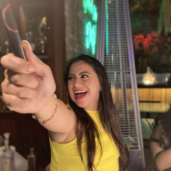 Olimpia Coral singing while celebrating her birthday.