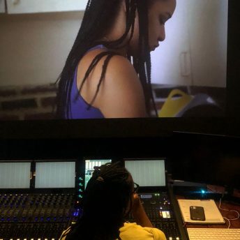 Director Rebeca Huntt sees footage on a screening room