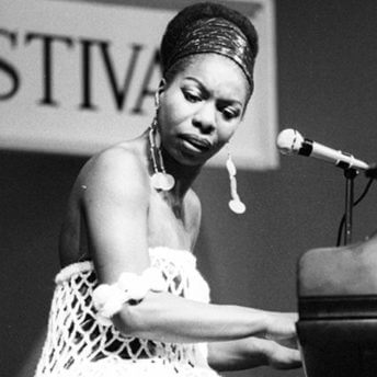 Cicely Tyson playing the piano