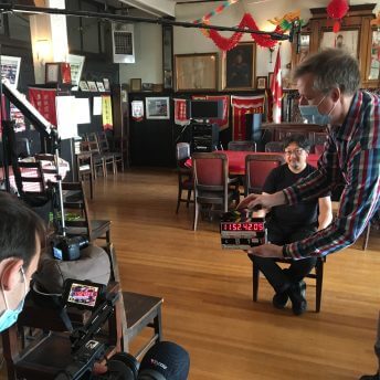 Crew setting up for Henry Yu's master interview in the Wong's Benevolent Association.