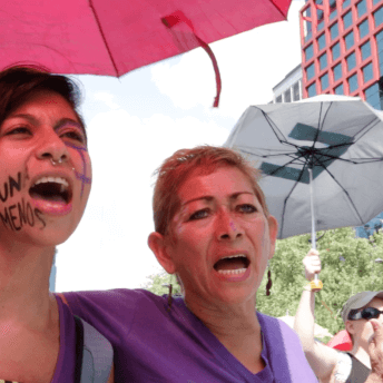 Matilde and Fany march and shout together at the April 24, 2016 march.